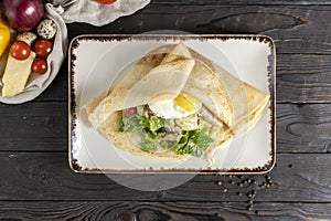 ÃÂ¡repe with salad and egg.